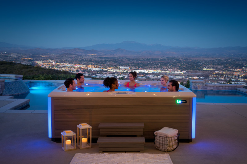 group enjoying a hot tub